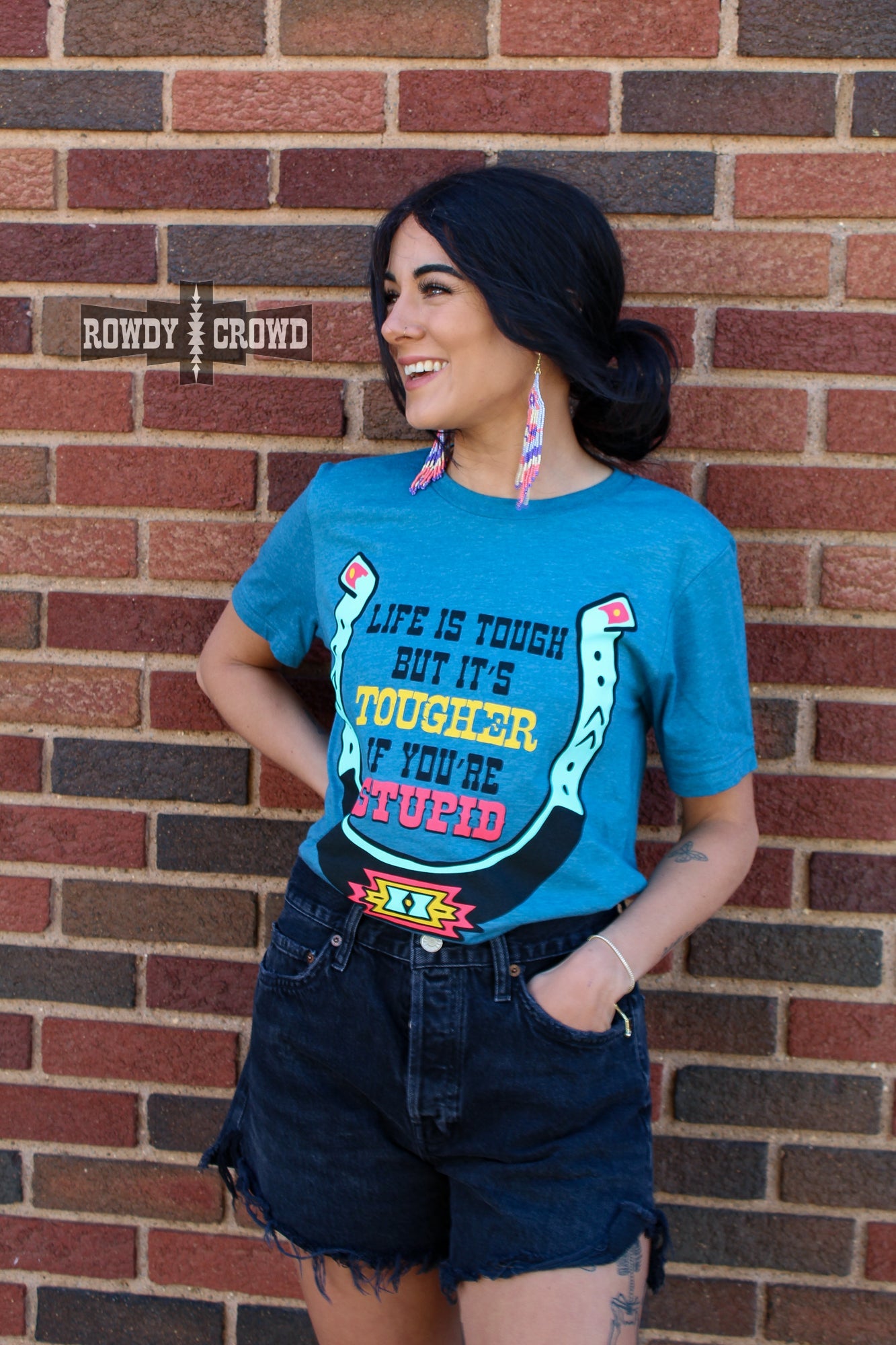 western apparel, western graphic tee, graphic western tees, wholesale clothing, western wholesale, women's western graphic tees, wholesale clothing and jewelry, western boutique clothing, western women's graphic tee, western cowgirl tee, western horseshoe tee, John Wayne quote graphic tee, tougher if you're stupid graphic tee