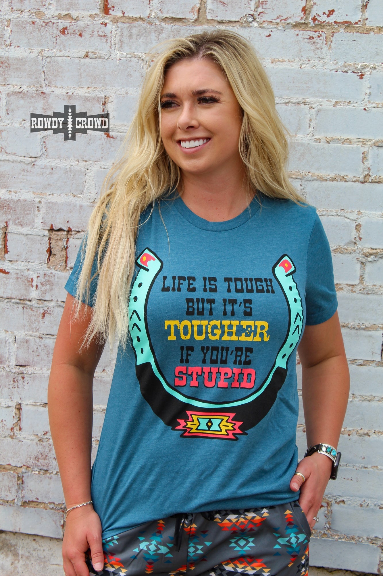 western apparel, western graphic tee, graphic western tees, wholesale clothing, western wholesale, women's western graphic tees, wholesale clothing and jewelry, western boutique clothing, western women's graphic tee, western cowgirl tee, western horseshoe tee, John Wayne quote graphic tee, tougher if you're stupid graphic tee