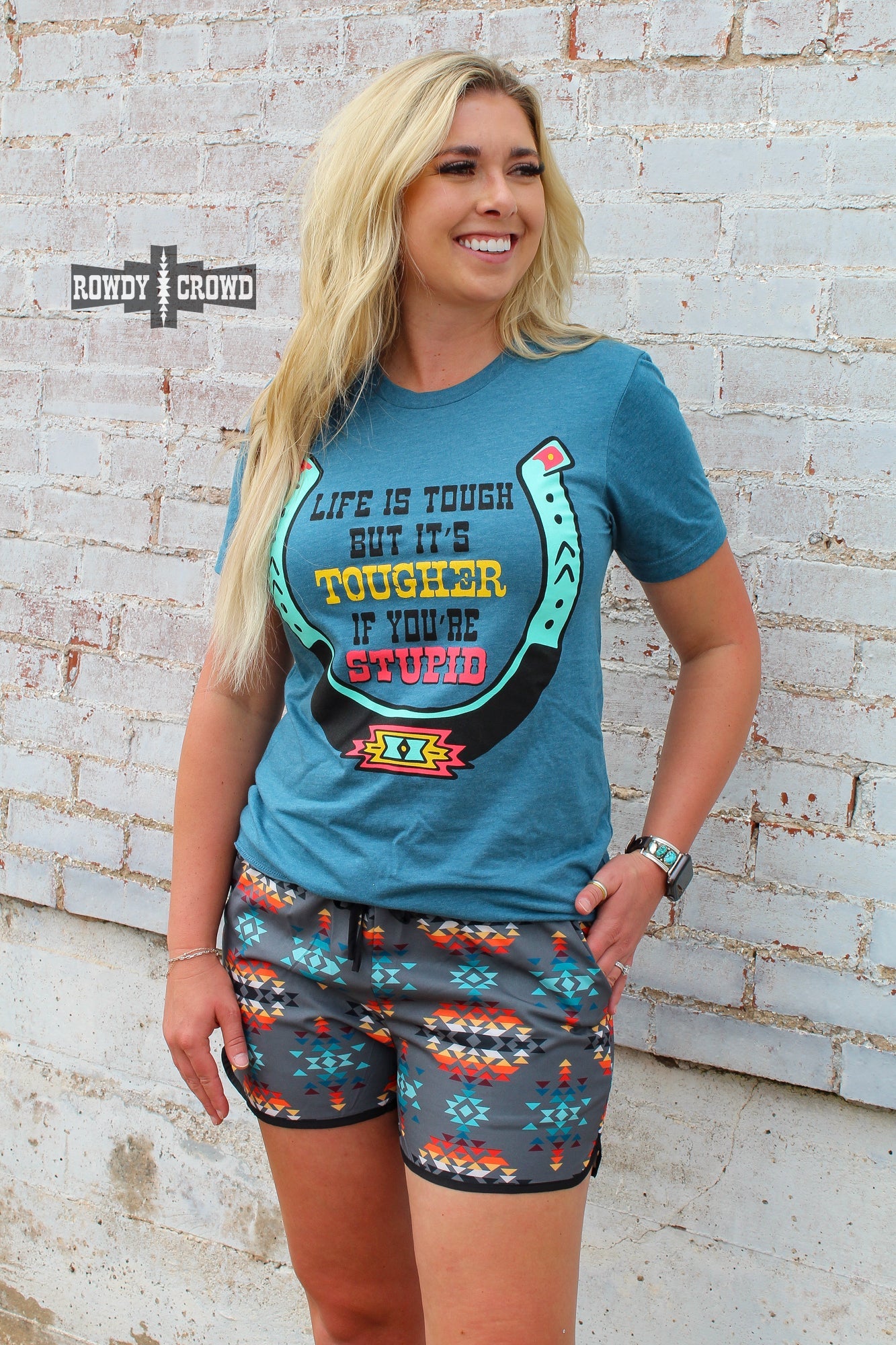 western apparel, western graphic tee, graphic western tees, wholesale clothing, western wholesale, women's western graphic tees, wholesale clothing and jewelry, western boutique clothing, western women's graphic tee, western cowgirl tee, western horseshoe tee, John Wayne quote graphic tee, tougher if you're stupid graphic tee